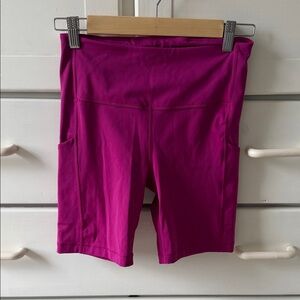 Athleta Magenta High-Rise Bike Shorts with Side Pockets